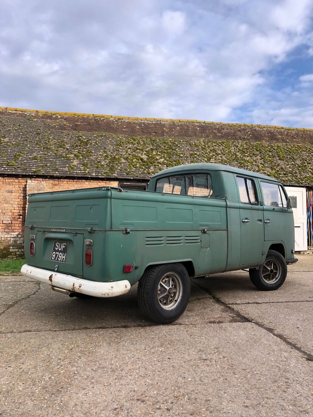 Green VW Bay pickup — rear view